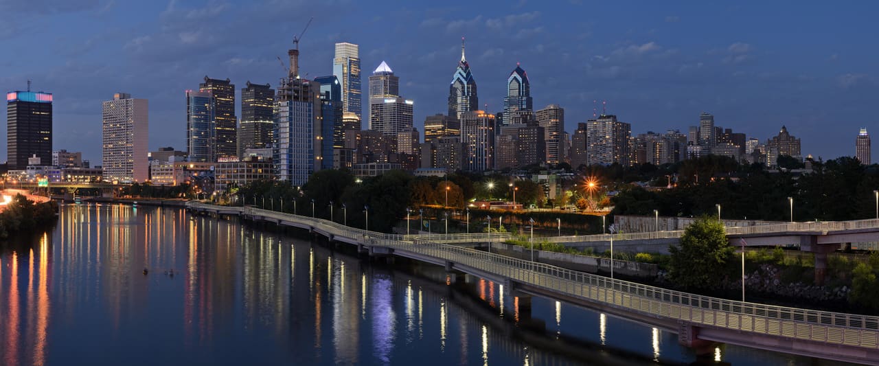 Philadelphia skyline at dusk over the Schuylkill River